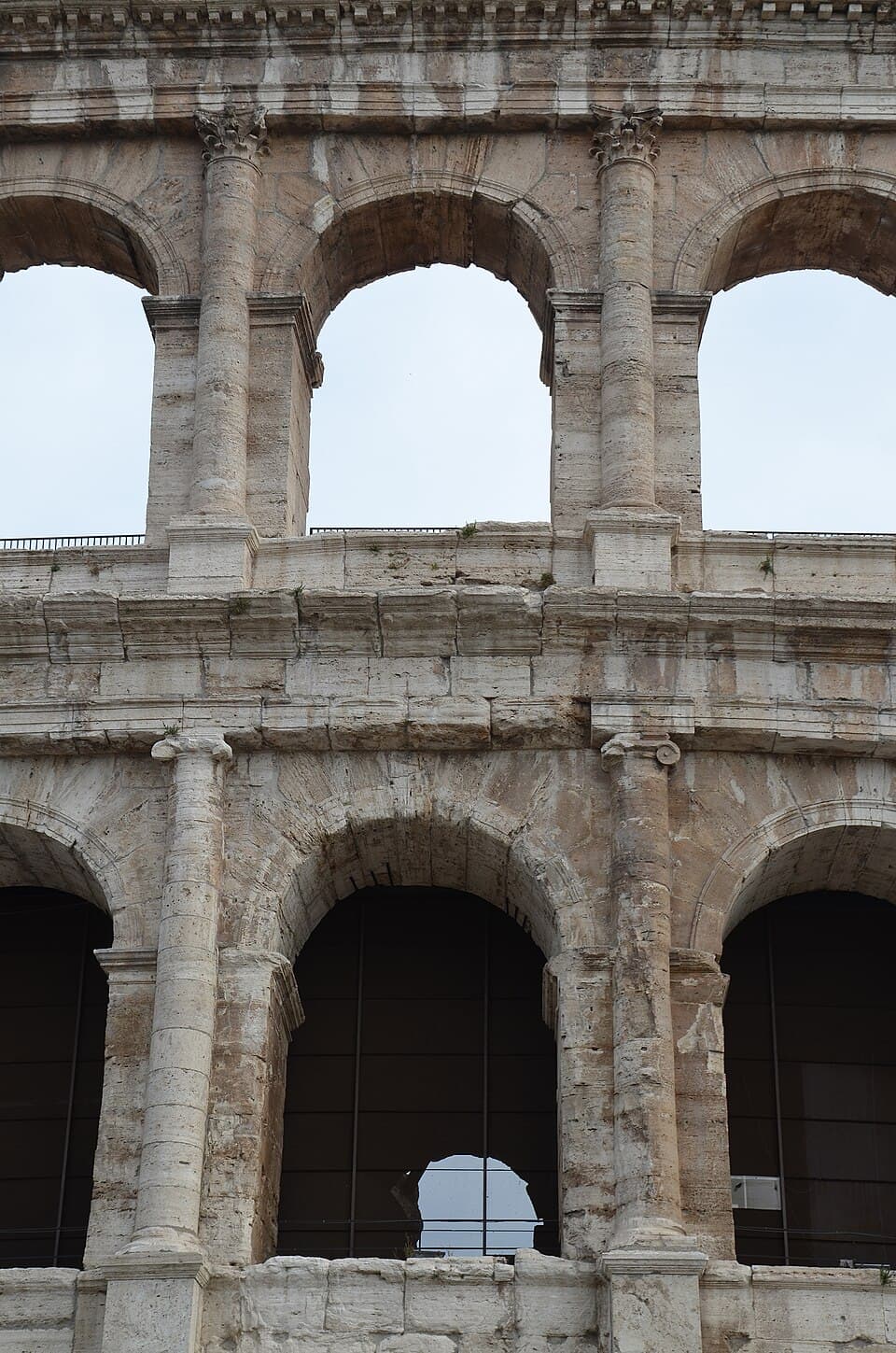 Travertine and Iron — Colosseo audio guide stop