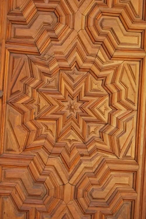 Geometric Wood Door — Palacio de Jabalquinto audio guide stop